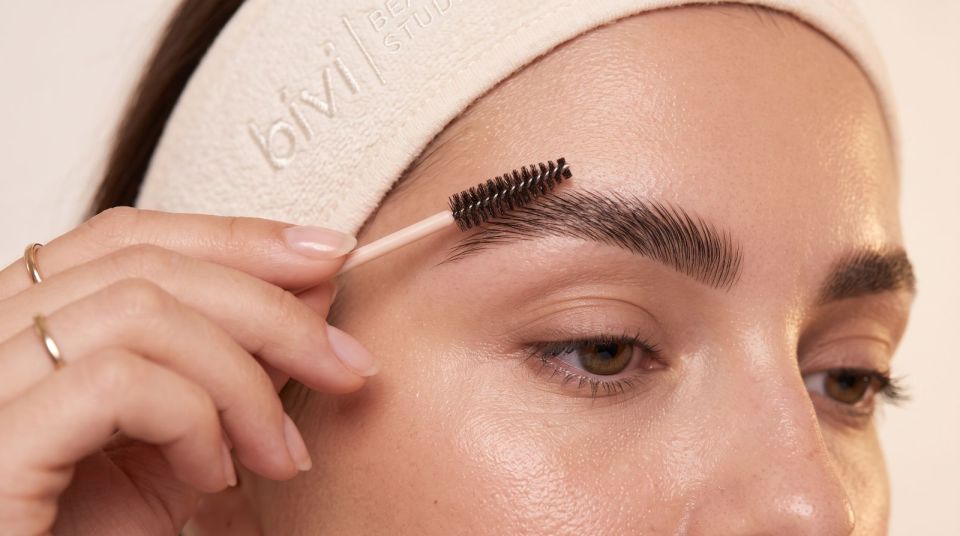 Brow lamination and shaping with a brush